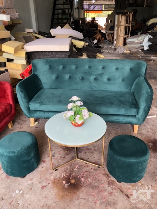 sofa nu hoang xanh la